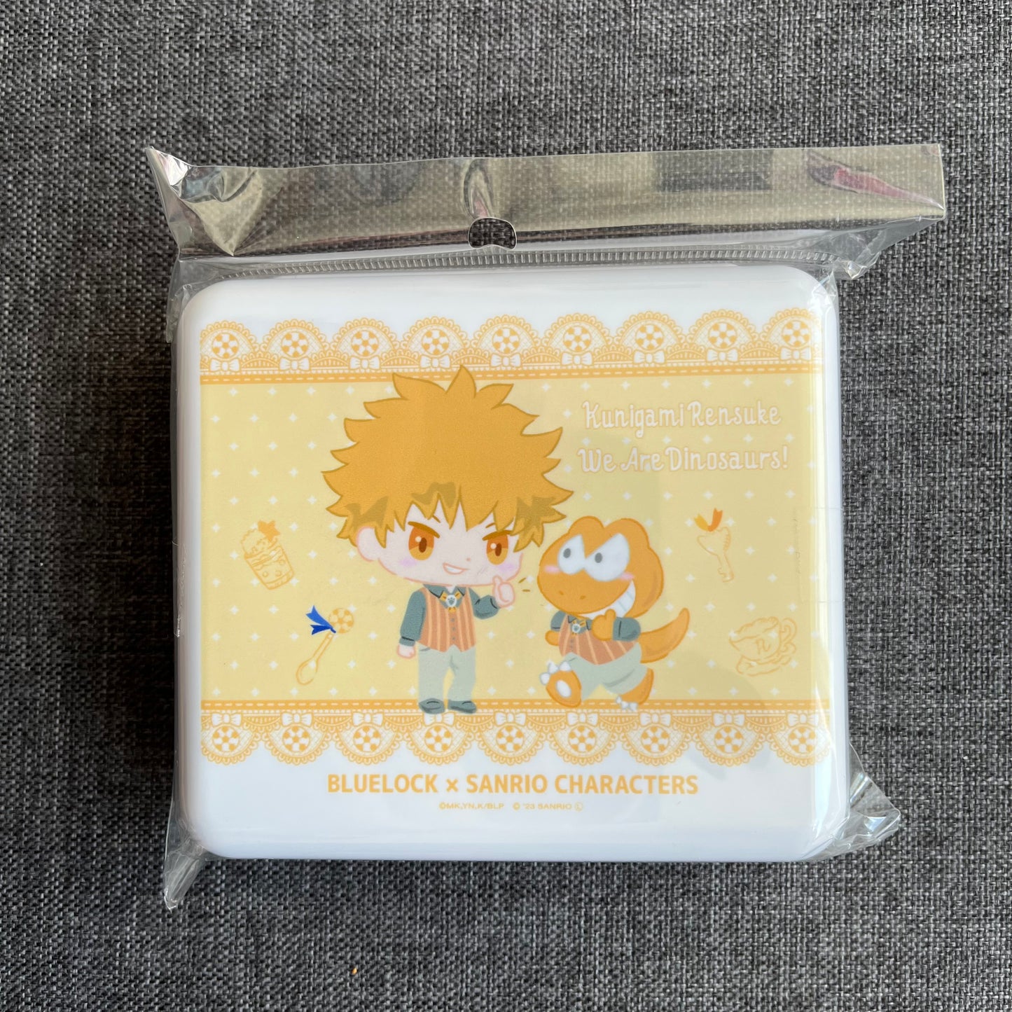 Blue Lock x Sanrio Kunigami We Are Dinosaurs Small Plastic Accessory Case